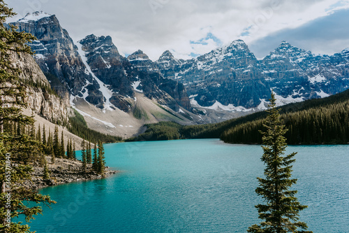 Fototapeta Naklejka Na Ścianę i Meble -  Breathtaking view of turquoise water of Moraine Lake, tourist popular attraction/destination in Canadian Rockies, Banff National Park, Alberta, Canada