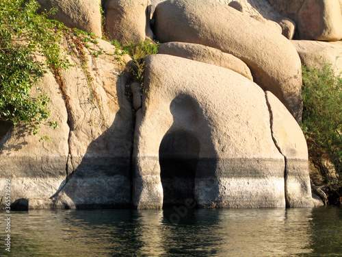 Interesting geological rock formation in the shape of an elephant by the Nile near Aswan, Egypt.  Travel and Egypt and geology concept.