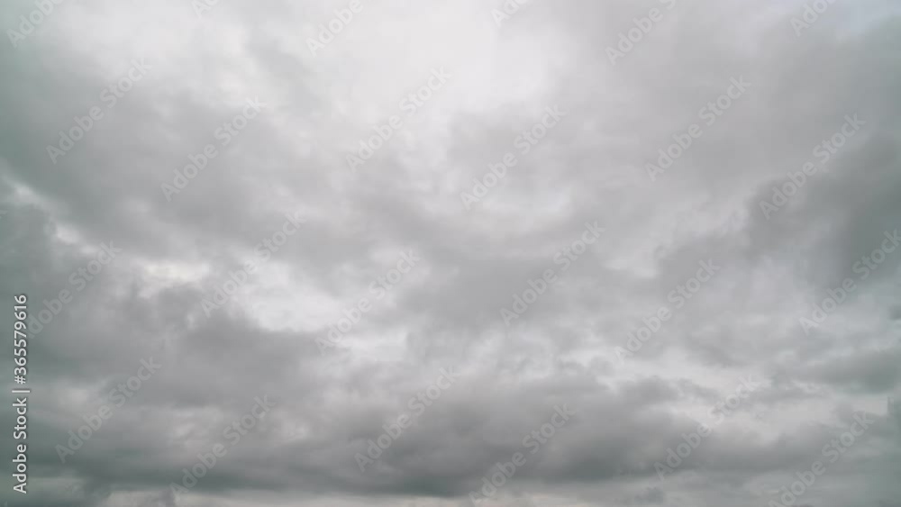 Time lapse 4K 3840x2160 of moving dark clouds in the sky in bad weather day Time lapse 4K 3840x2160 of moving dark clouds in the sky in bad weather day