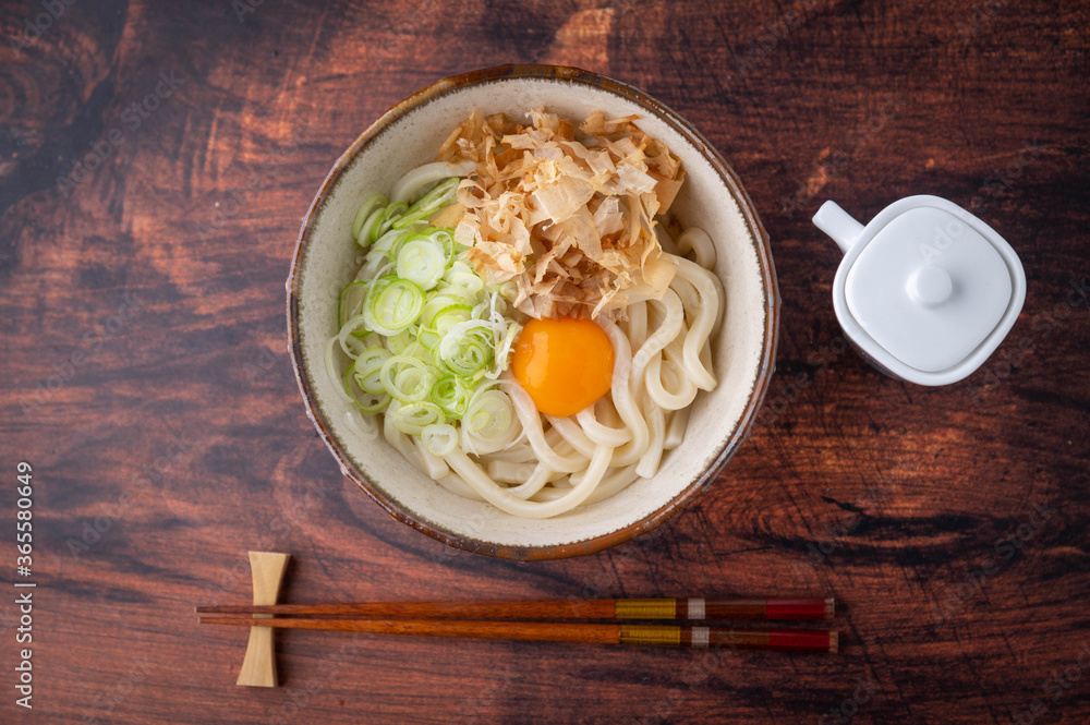 cold japanese udon noodles with raw egg yolk cold japanese udon noodles with raw egg yolk