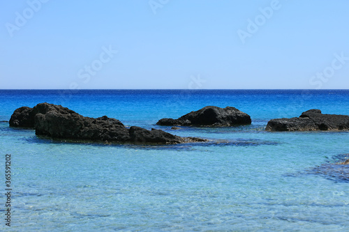 Kedrodasos beach private paradise blue lagoon free camping area rocky coast with crystal waters and corals covid-19 season prints photo