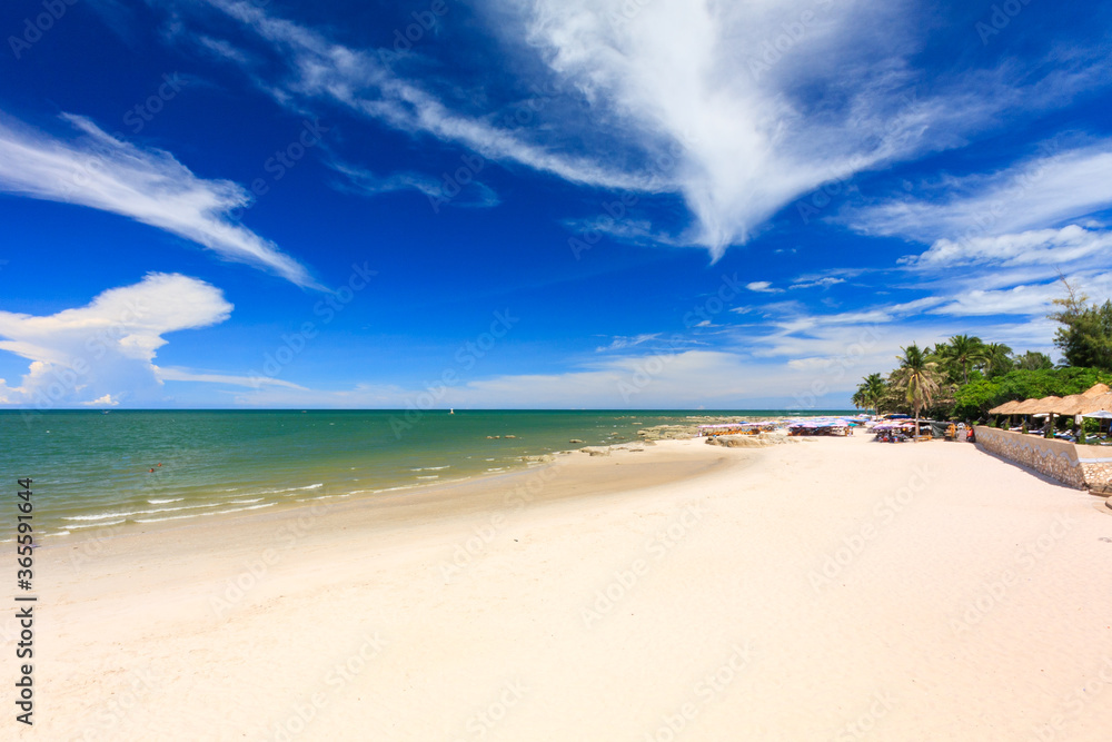 The beach in front of a large hotel