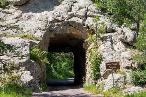 Iron Creek Tunnel sign on the Needles Highway through Custer State Park is a one-way narrow tunnel on the scenic drive