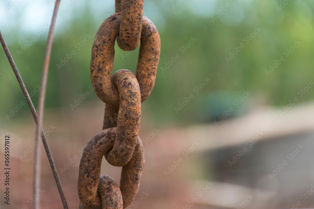 Chain rusted, vertical shot behind the blur Chain rusted, vertical shot behind the blur