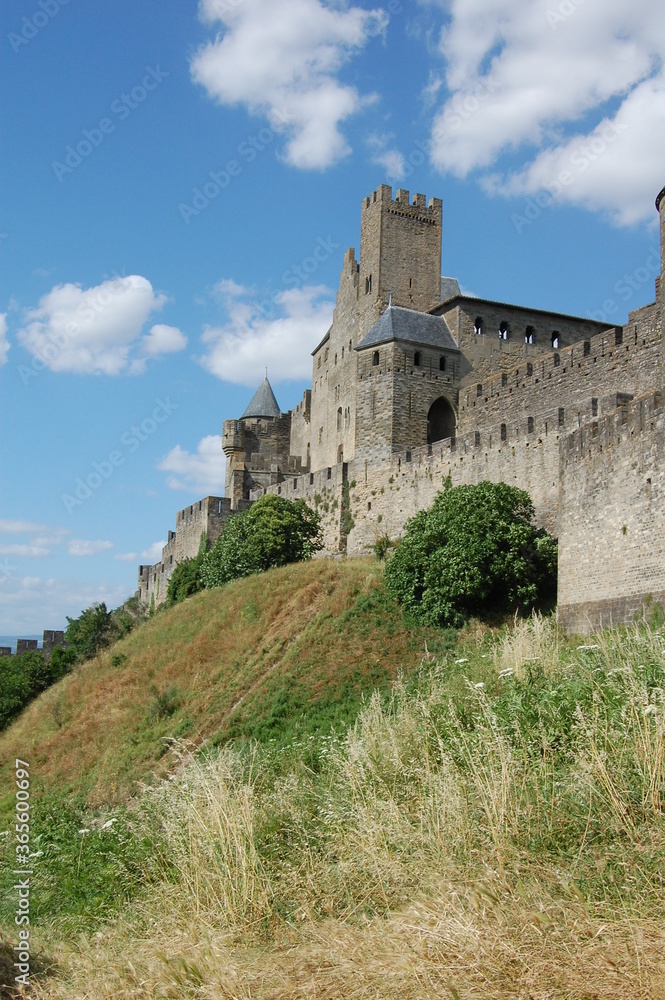 Carcassonne castle side view, Carcassonne Provence, France, side view of the castle from the side of the hill in a sunny day in Provence. Middle age castle UNESCO.