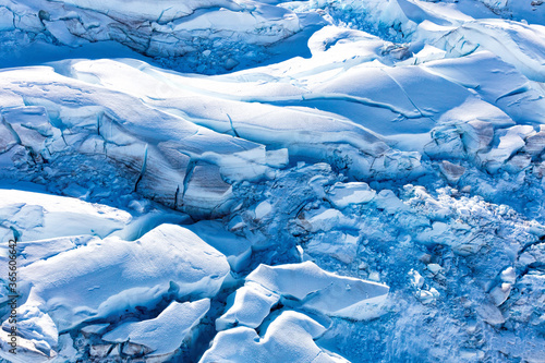 Aerial view of a snow capped glacier in Alaska