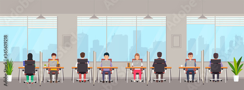 Coworking space with people. Young people men and women work on laptops behind separate workstation with partition in creative office. Shared working environment with large windows.