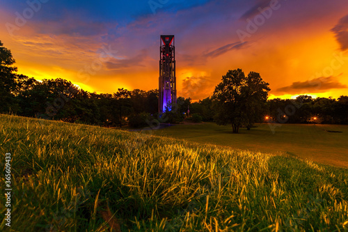 Naperville's Carillon rises above Rotary Hill at sunset just after a passing storm photo