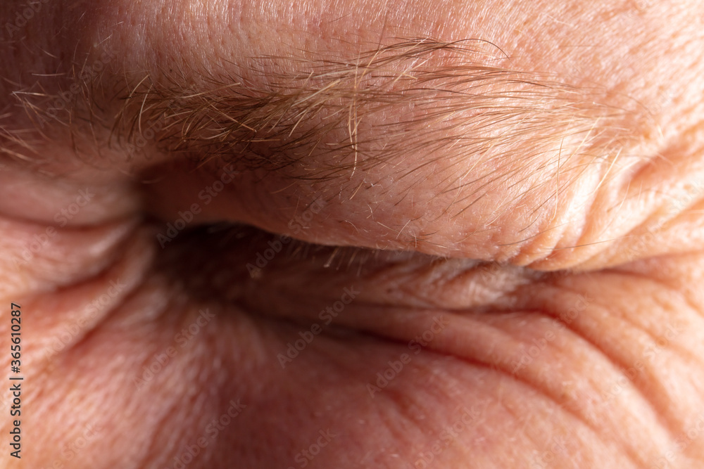 Close up of man’s closed eye. Close up of man’s closed eye.