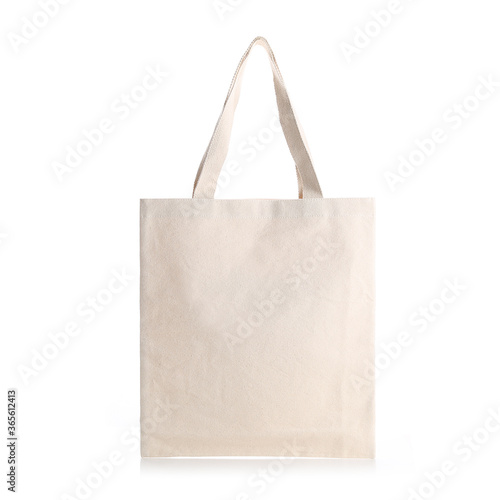 Blank Eco Friendly Beige Colour Fashion Canvas Tote Bag for branding, Isolated on White Background. Clear reusable Bag for Groceries mock up. Empty linen fabric tote bag for template. Front View. photo