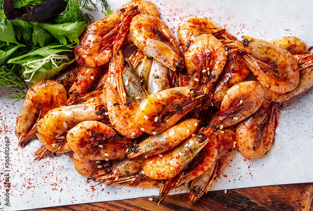 Closeup on roasted shrimps prawns appetizer