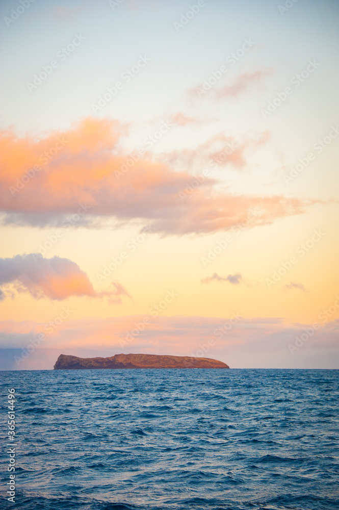 The island of Molokini, tinted sky, Maui, Hawaii