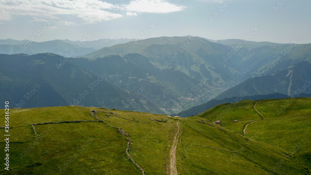 Obraz premium mountain landscape with green grass 