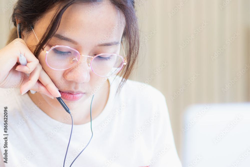 Work from home during the outbreak of the virus. Attractive young woman working with laptop and meeting video conferrence with the team.. Work from home during the outbreak of the virus. Attractive young woman working with laptop and meeting video conferrence with the team..
