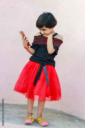 Indian little girl with mobile phone