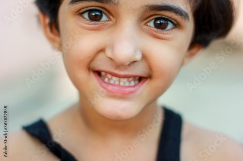 indian little girl giving multiple expression