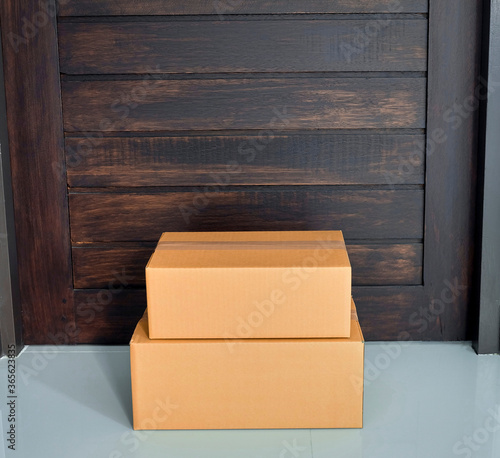 Quarantine or self isolated family receiving parcel box to door