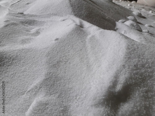 Background blur white urea pile.