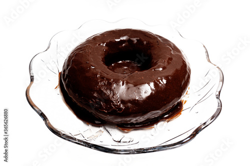 Traditional Brazilian cake - Chocolate cake with brigadeiro sauce. Isolated on white background. Side view.