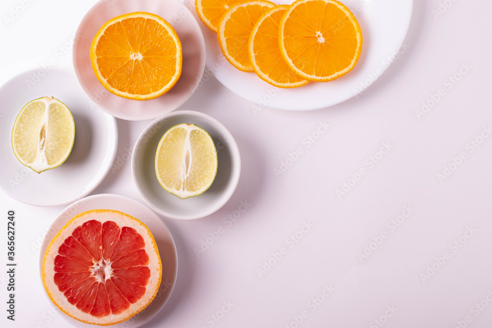 sliced citruses on white sliced citruses on white