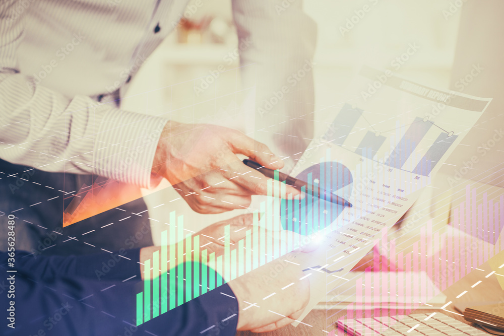 Financial trading graph double exposure with man desktop background. Financial trading graph double exposure with man desktop background.