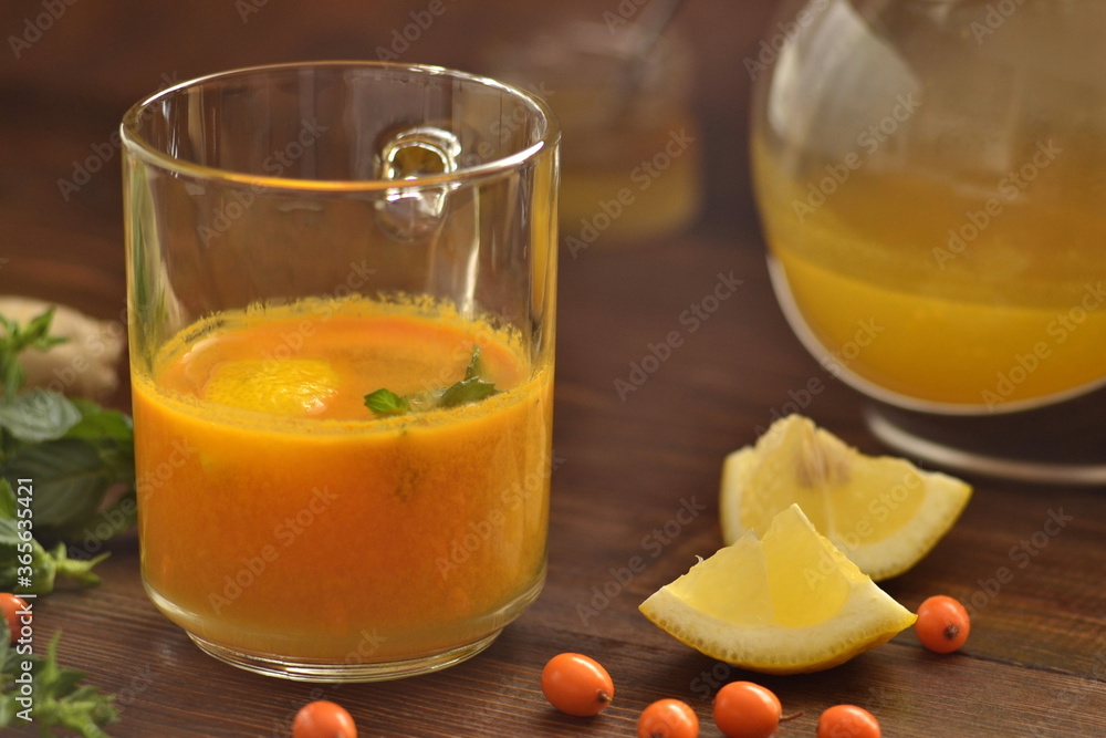 Sea buckthorn tea with lemon, honey and mint Sea buckthorn tea with lemon, honey and mint