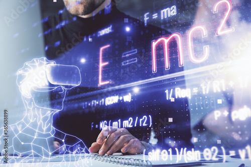 Science formula hologram with man working on computer on background. Education concept. Double exposure.