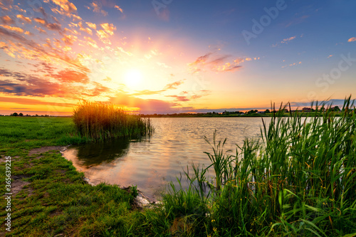 Beautiful summer sunset at lake