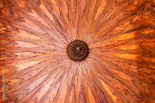 GRANADA, SPAIN - MAY 5, 2017: Dome and ceiling of the room in Alhambra, Granada, Spain. The Alhambra is a palace complex located in Granada, Andalusia, Spain. It's a UNESCO World Heritage Site photo