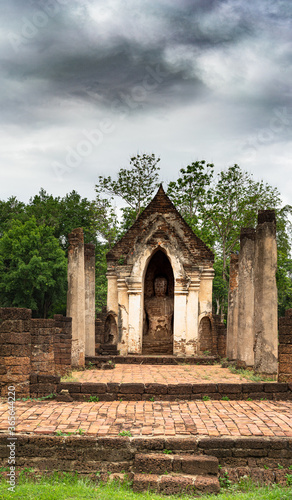 ruins of an ancient small Buddhist temple in Si Satchanalai historical park, Sukhothai Thailand