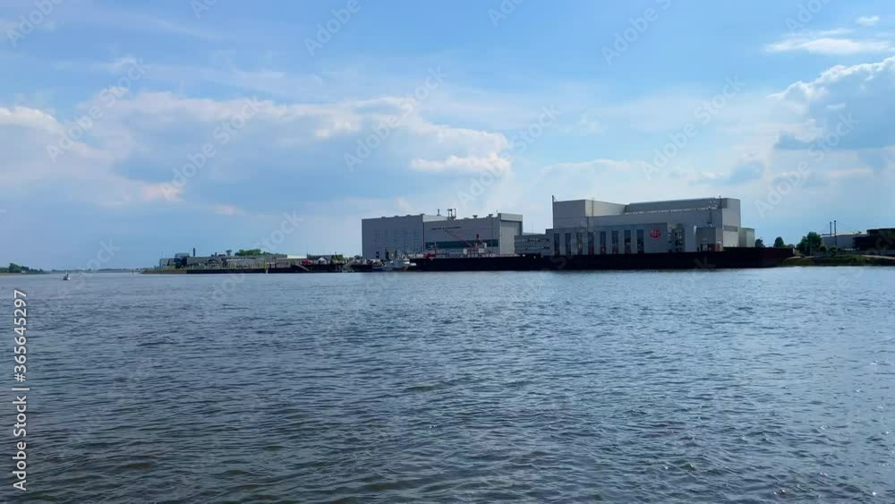 Bremen Germany, 07/17/2020: The Weser is filmed from a ferry crossing the river on a nice day with traffic Bremen Germany, 07/17/2020: The Weser is filmed from a ferry crossing the river on a nice day with traffic