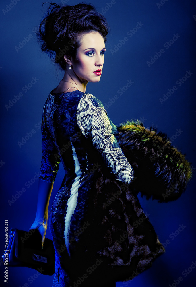 fashion model woman over blue background
