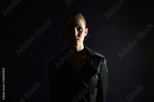 Beauty woman silhouette in the dark. Beautiful Girl