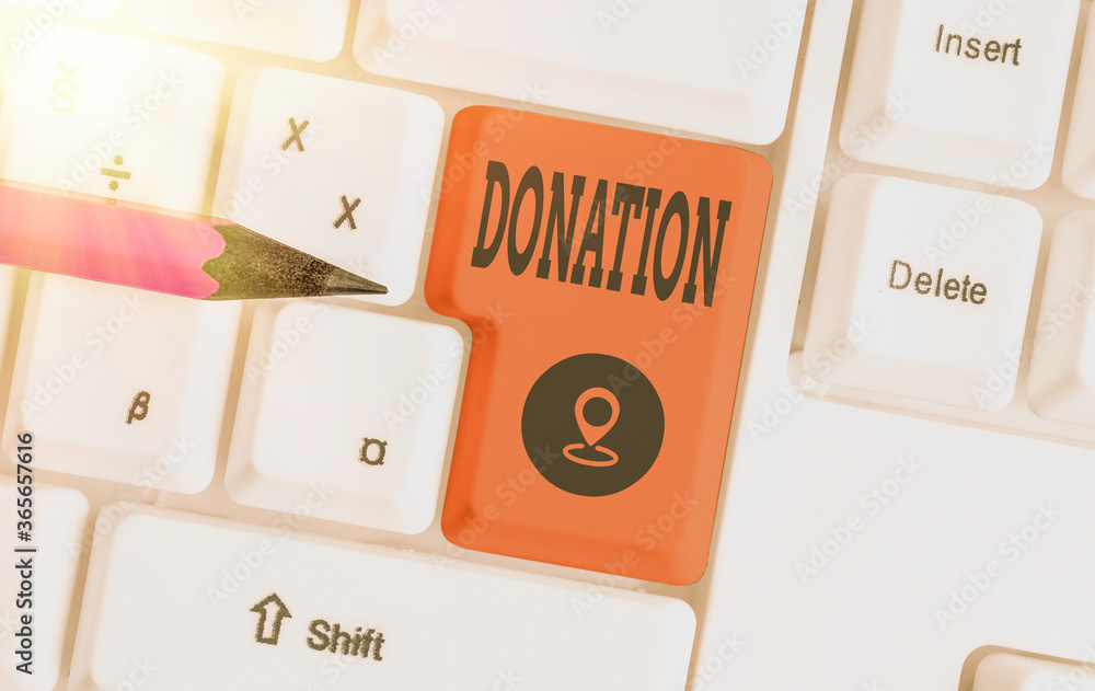 Handwriting text writing Donation. Conceptual photo something that is given to a charity, especially a sum of money Different colored keyboard key with accessories arranged on empty copy space Handwriting text writing Donation. Conceptual photo something that is given to a charity, especially a sum of money Different colored keyboard key with accessories arranged on empty copy space