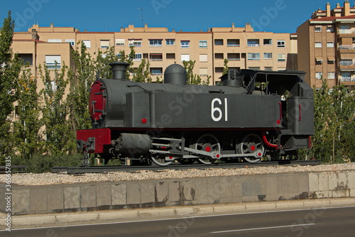 Historical steam locomotive at the Almozara Bridge in Zaragoza,Spain,Europe
 photo