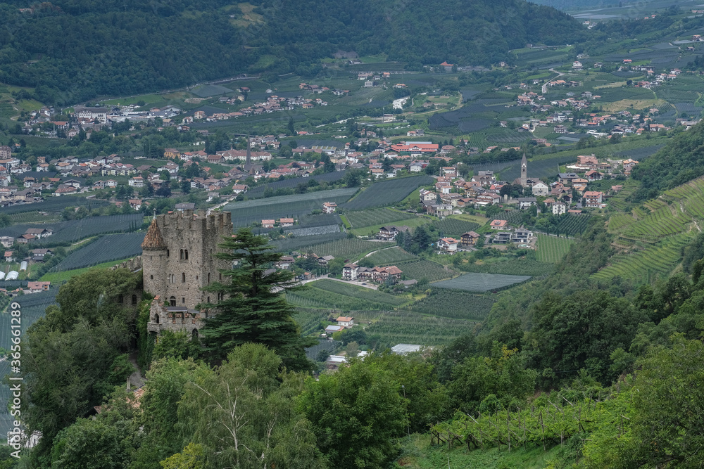 View of Fontana medieval castle above Merano as seen from the Apple Orchards trail above the town, Merano, South Tyrol, Italy.