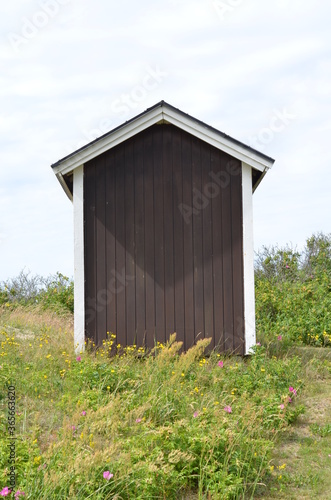 Beach hut on the sea coast for social isolation type holidays, the new normar. photo