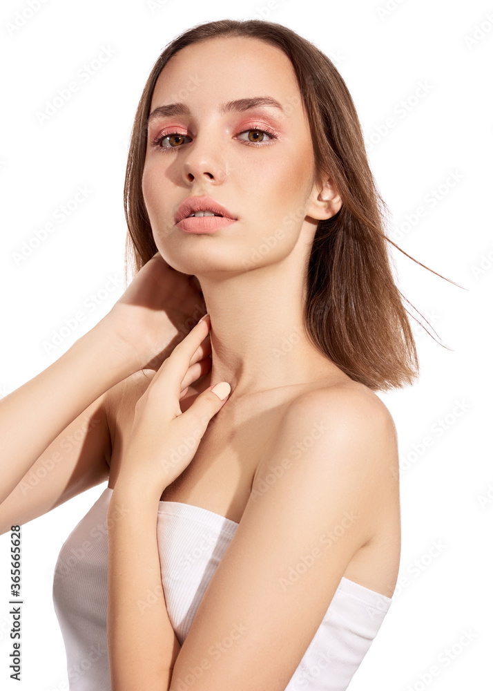 Sensual pretty woman with beautiful short brown hairs on wind, posing isolated on white. Close portrait of a girl with natural makeup. Sensual pretty woman with beautiful short brown hairs on wind, posing isolated on white. Close portrait of a girl with natural makeup.