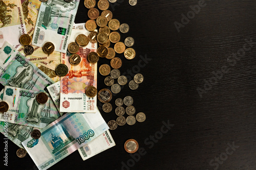 russian money coins and paper rubles lying on the table
