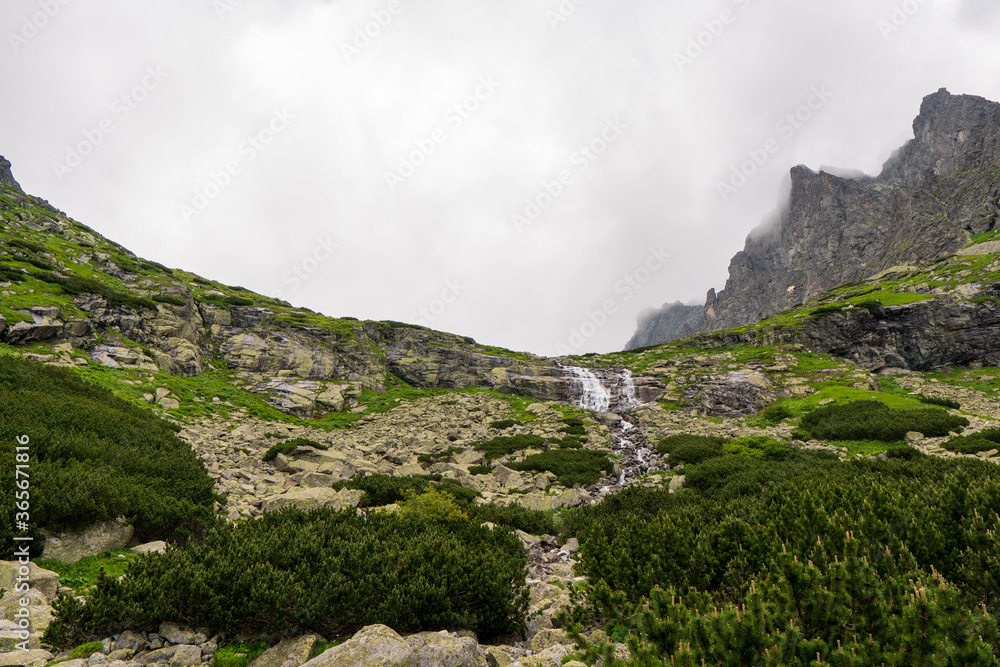 Majestic Hidden Waterfall in Natural Landscape. Tatras mountain slovakia. velicky waterfall