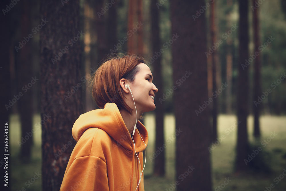 Young pretty girl with earphones