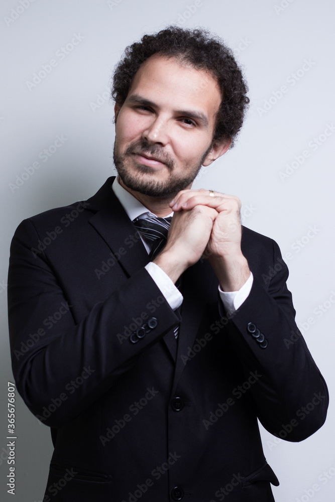 handsome young businessman with arms crossed handsome young businessman with arms crossed