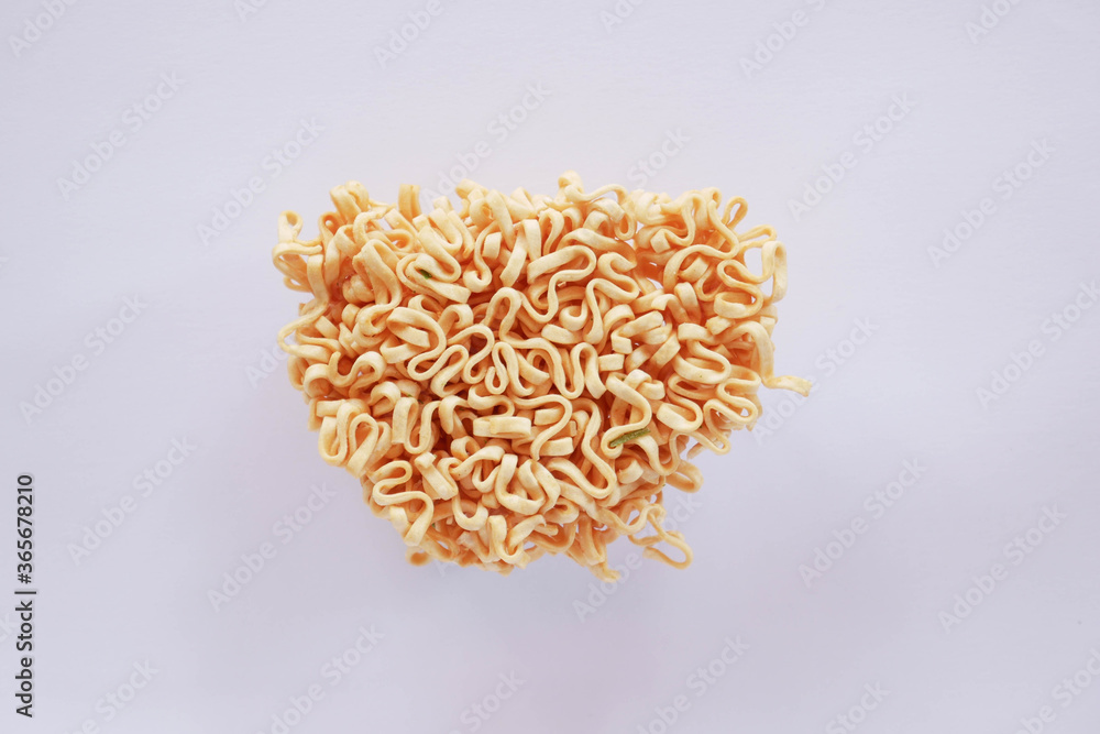 Fototapeta premium top view of Instant noodles on white background