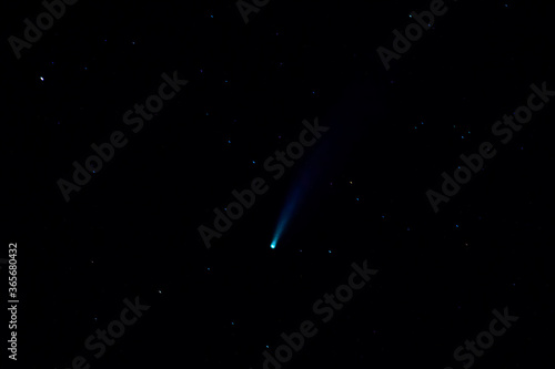 horizontal night photography of neowise comet and the stars