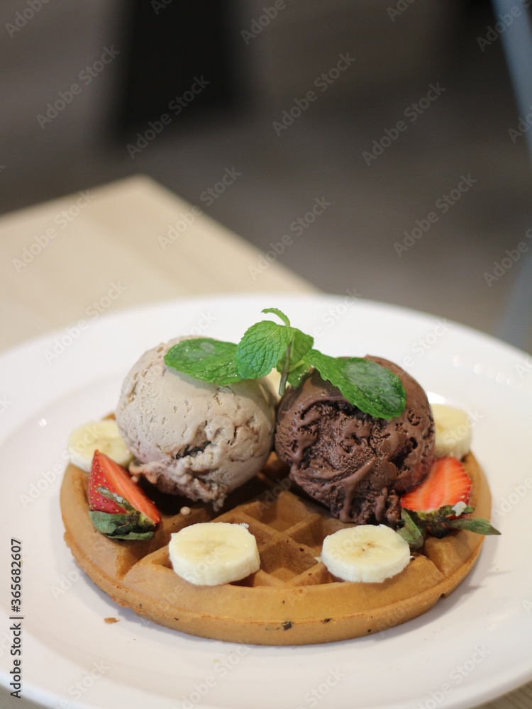 Ice Cream Waffles. Chocolate and Coffee Ice Cream on top of Waffle. Ice Cream Waffles. Chocolate and Coffee Ice Cream on top of Waffle.