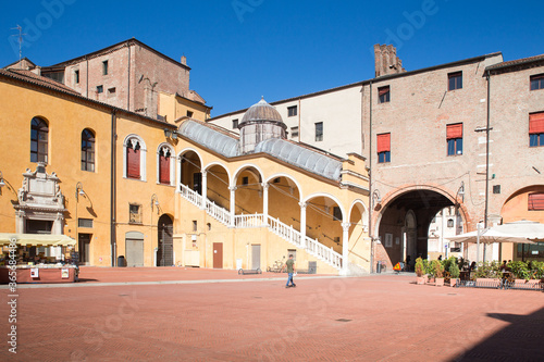 Ferrara, Italy, town hall square in a summer sunny day