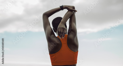 Woman doing hand stretching exercise