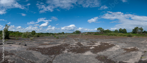 Billede på lærred The overgrown remains of a runaway of an old air force base in Suffolk, UK