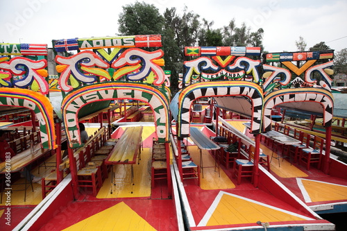 View of Xochimilco Canal boats on the river in the south of Mexico City, Mexico photo