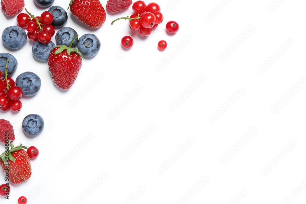 Mix of fresh berries on white background, flat lay Mix of fresh berries on white background, flat lay